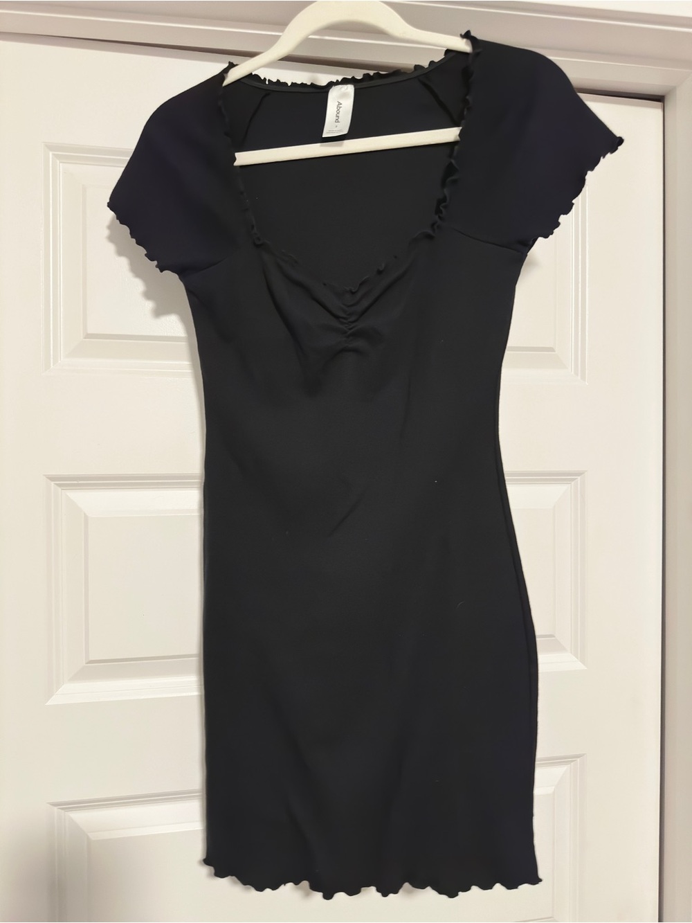 Black scalloped edge mini dress